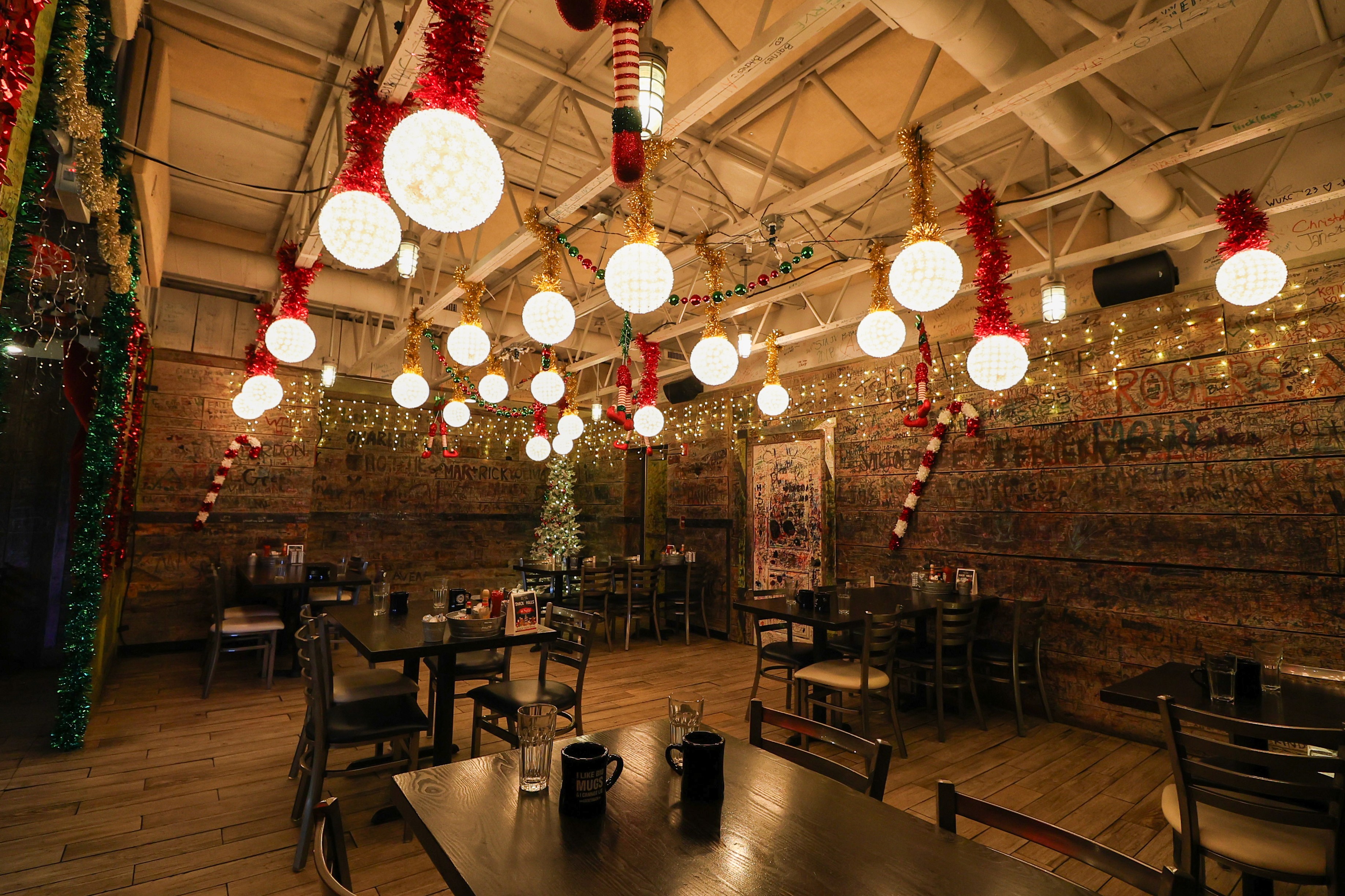 Bar interior with hanging globe lights and twinkle décor